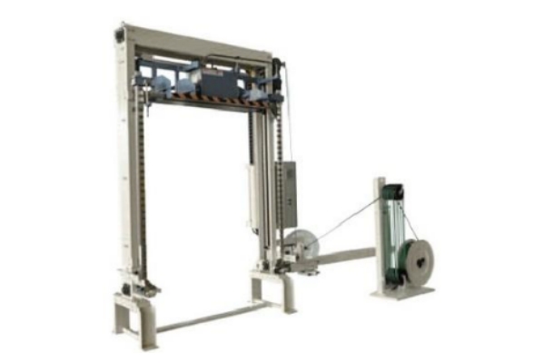 Top through type strapping machine